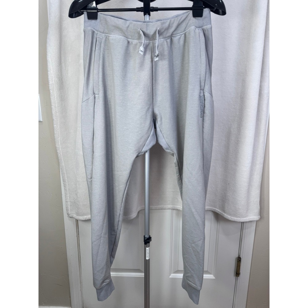 Women's Gymshark gray cuffed ankle drawstring zipper pockets joggers Size L